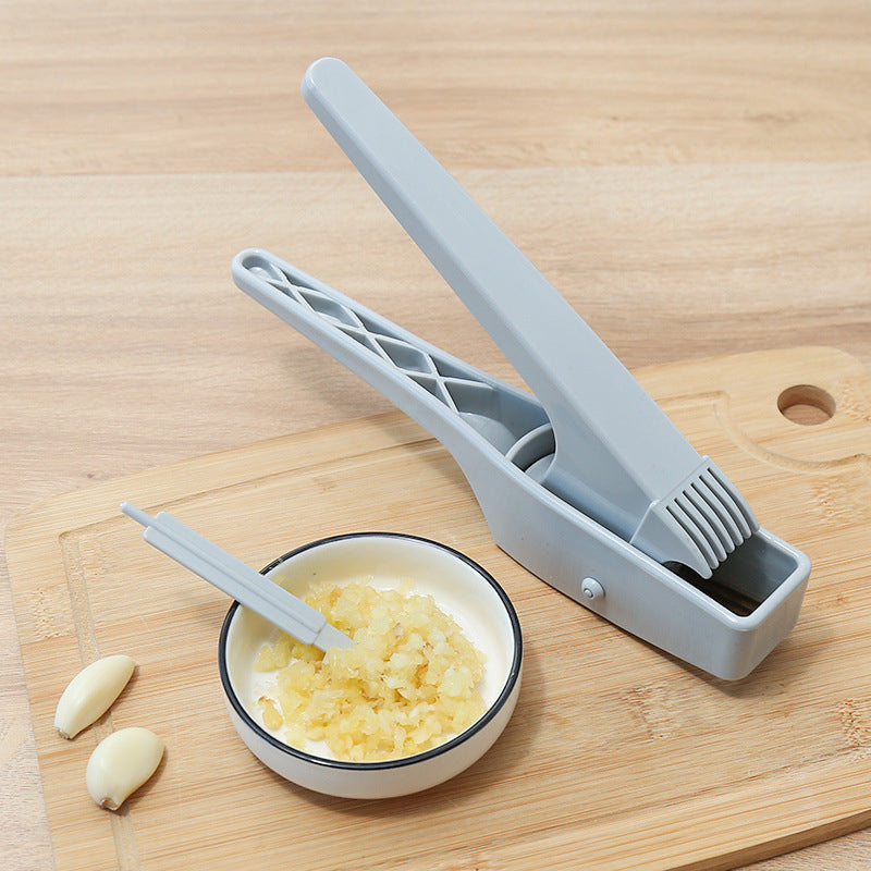 Multifunctional garlic press